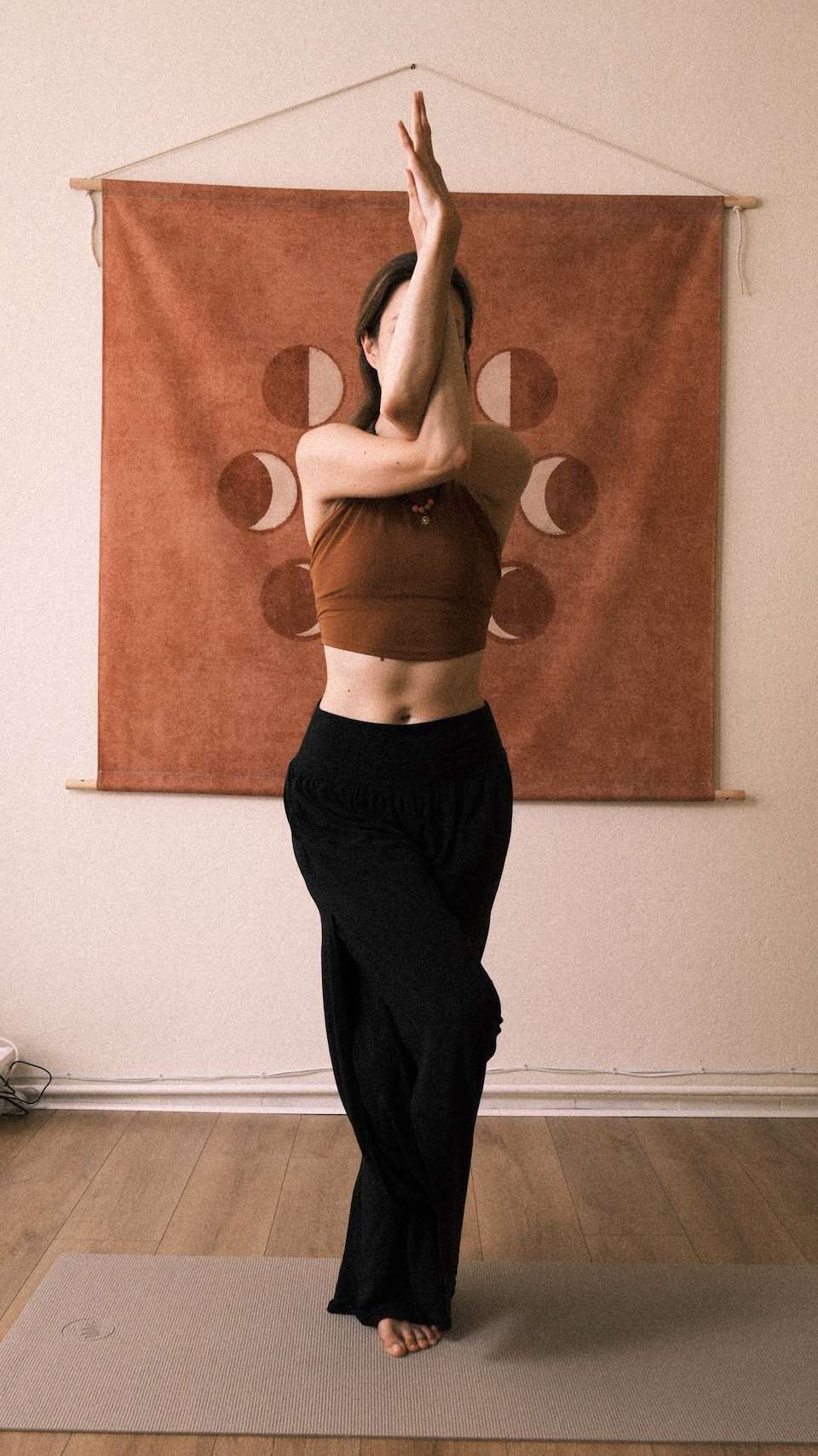 Woman doing Yoga in standing